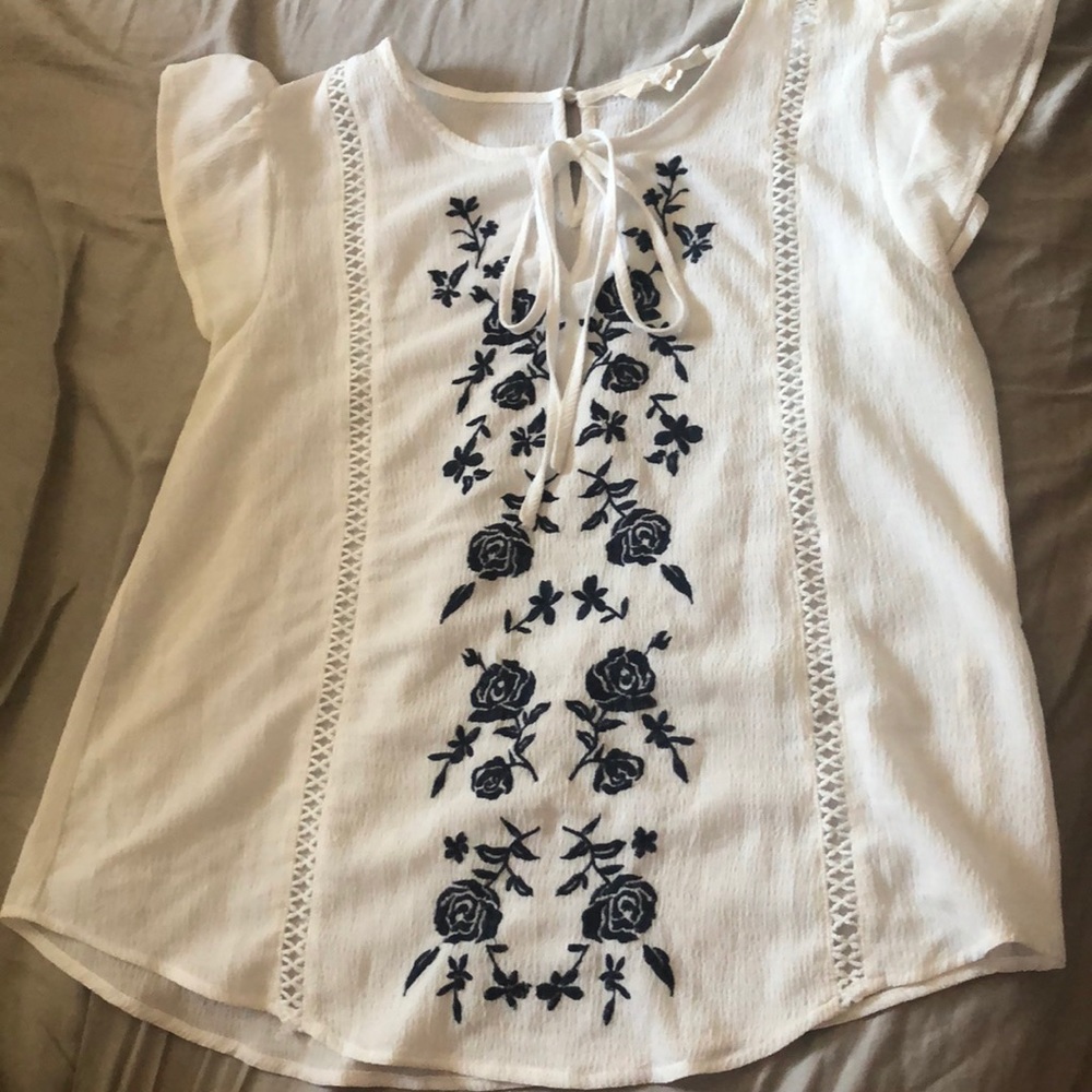 White blouse with flowers